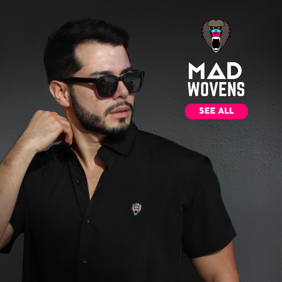 Mad Wovens: A model with sun glass wearing  Mad Chuck black polo.